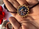 Load image into Gallery viewer, Octagonal Blossom Intense Ajrakh Mini Beaded Enchanted Rakhi