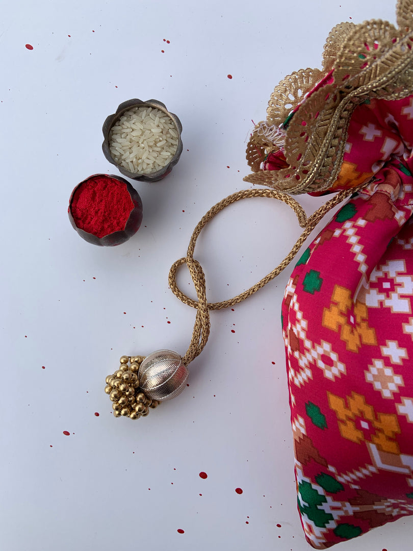 Pink Navratna Pointed-Edge Potli - IBHI