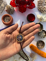Load image into Gallery viewer, Octagonal Blossom Intense Ajrakh Mini Beaded Enchanted Rakhi