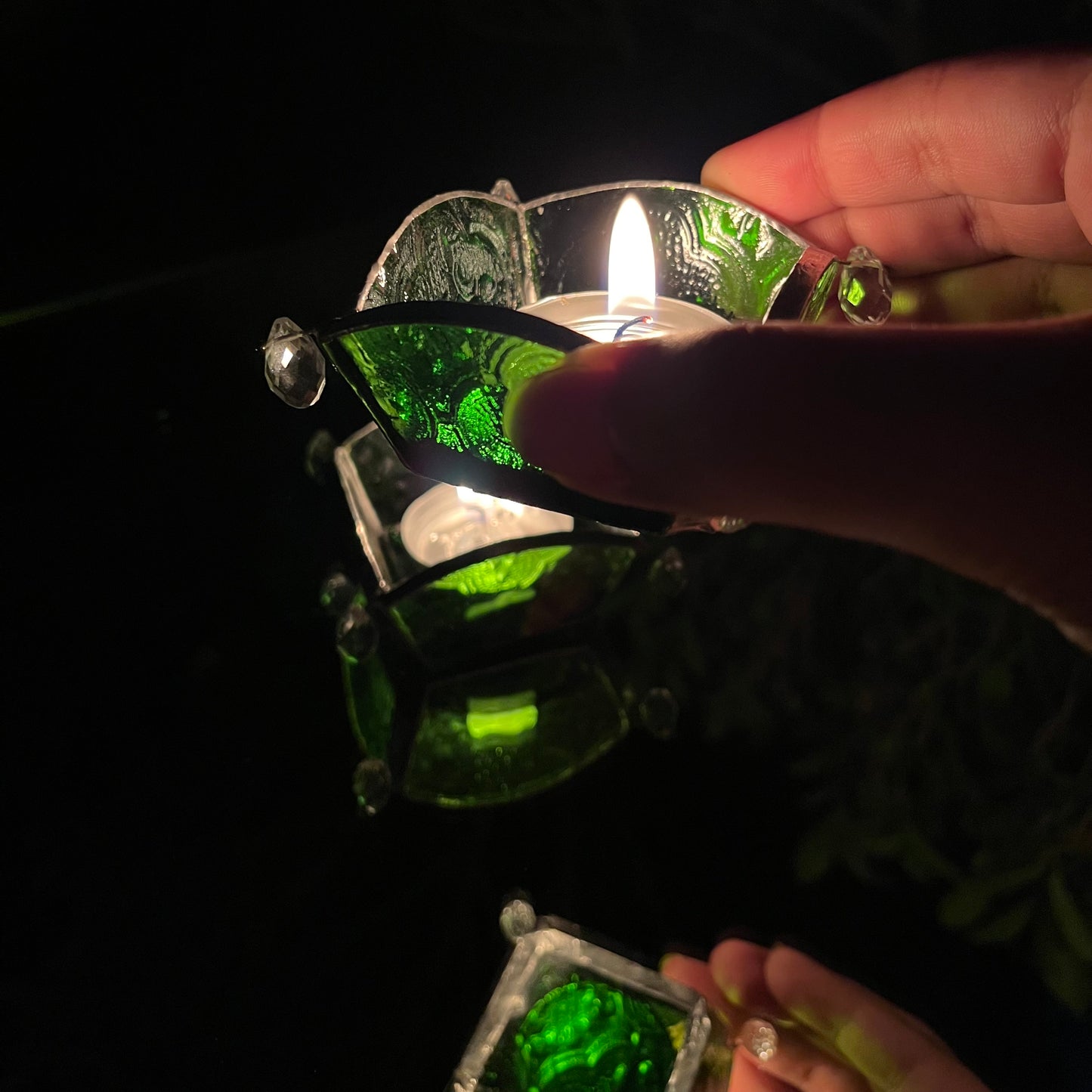 Green colored glass t-light holder