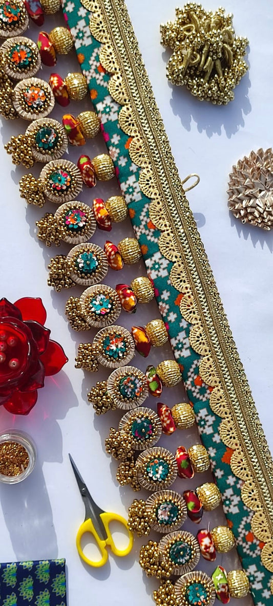 SLEEK: Maroon & Bottle Green Navratna Patola Plumeria Toran (SOLID)
